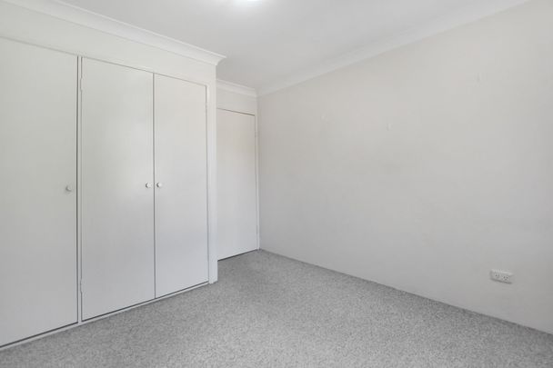 SPACIOUS TWO BEDROOM UNIT ON TOP FLOOR - Photo 1