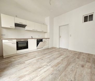 Renovierte Wohnung mit Balkon und Einbauküche - Photo 6