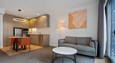 Chic 1-Bedroom Fully Furnished Apartment - Photo 3