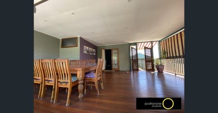 Spacious Family Home with Pool, Entertainer’s Deck & Fully Grassed Yard. - Photo 4