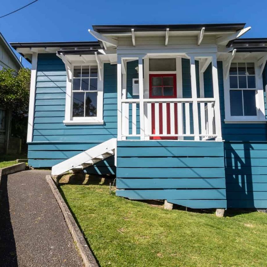 Charming Three-Bedroom Home - Photo 1