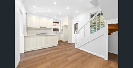 Fully Renovated Family Home | Air Conditioning in Every Room | Spacious Yard - Photo 2