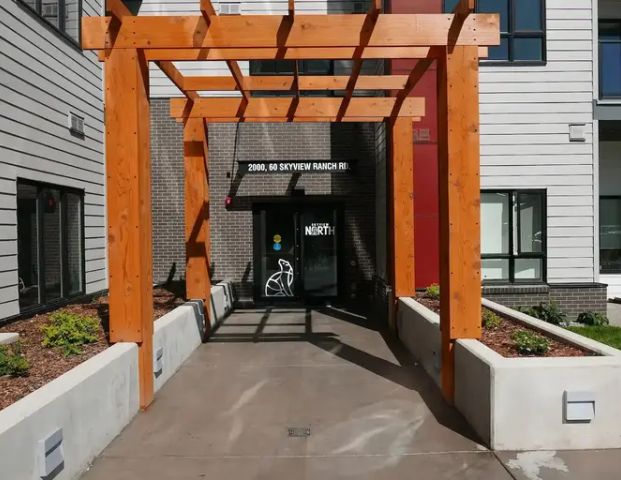 BRAND NEW NEVER BEEN LIVED IN 2BED/2BATH SPACIOUS UNIT MOUNTAIN/ CITY VIEWS | 2503 - 60 Skyview Ranch Rd NE, Calgary - Photo 1