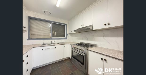 CONVENIENT LOCATION AND FRESHLY PAINTED FAMILY HOME - Photo 1