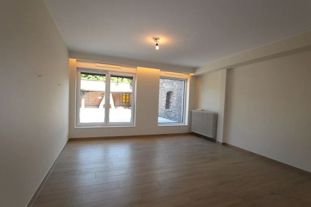 RIANT APPARTEMENT MET GROOT TERRAS EN 3 SLAAPKAMERS - Photo 1