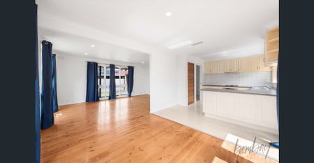 Spacious & Sunlit Living - Photo 2