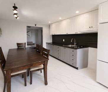 Grand 4½, proximité avec les écoles, une cour privé et 2 stationnem... - Photo 2