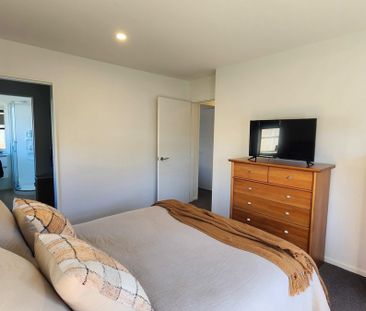 Modern Four-Bedroom Home with Lawn Maintenance Included - Photo 5