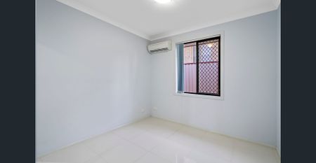 Modern Family Home with Split-System Air-Conditioning Throughout - Photo 5