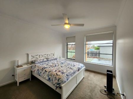 CHARMING FAMILY HOME WITH MODERN FEATURES AND SPACIOUS YARD - Photo 2