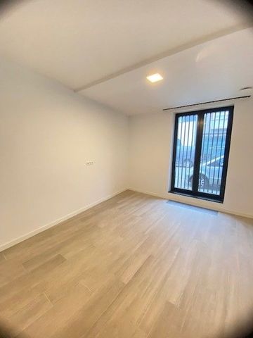 Gelijkvloersappartement van 80 m² in centrum Diepenbeek - Photo 5