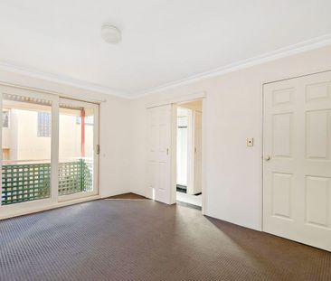 Serene Living Awaits - Beautifully Appointed Two-Bedroom Townhouse - Photo 2