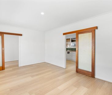 Parkside Comfort with Updated Interiors and Generous Living - Photo 1