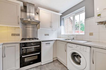 A modern three bedroom home with garage and off-street parking in a cul-de-sac location. - Photo 2