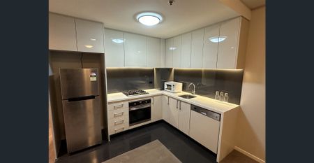 Fully Furnished Sophisticated two bedroom apartment promises urban convenience - Photo 5