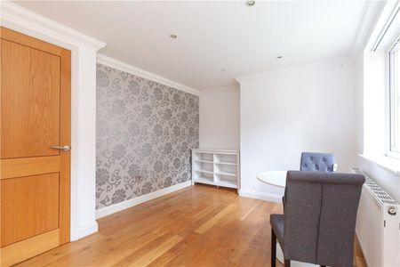 Two bedroom ground floor apartment with private rear garden and parking. - Photo 4