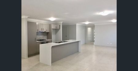 Freshly Updated Family Home in Highly Sought-After Morisset Park - Photo 2