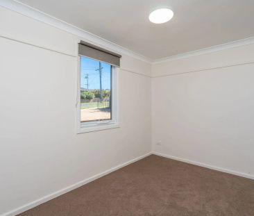 Updated 3 Bedroom Cottage in Prime Location - Photo 2