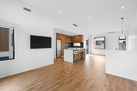 Discover the perfect blend of design, space, and location in this stunning three-bedroom, two-bathroom home over two levels on Victoria Street. - Photo 4
