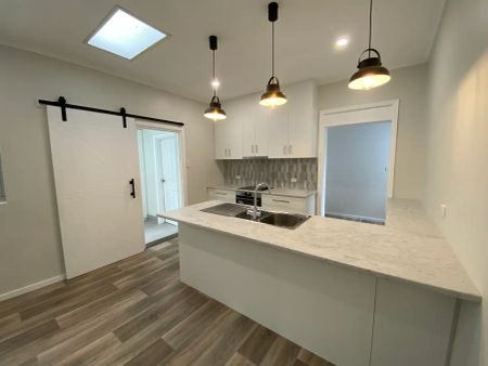 “Renovated Family Home Awaiting New Tenants” - Photo 4