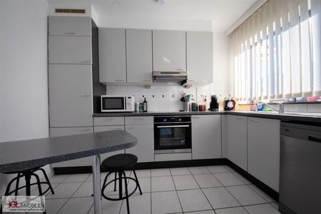 Ruim appartement met 2 kamers en gesloten garagebox - Photo 3