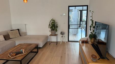 Licht en ruim 2-slaapkamerappartement met zuidoost georiënteerd terras en garagebox. - Photo 3