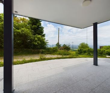 Helle 3.5-Parterrewohnung mit traumhaftem See- & Bergblick in Hause... - Photo 1