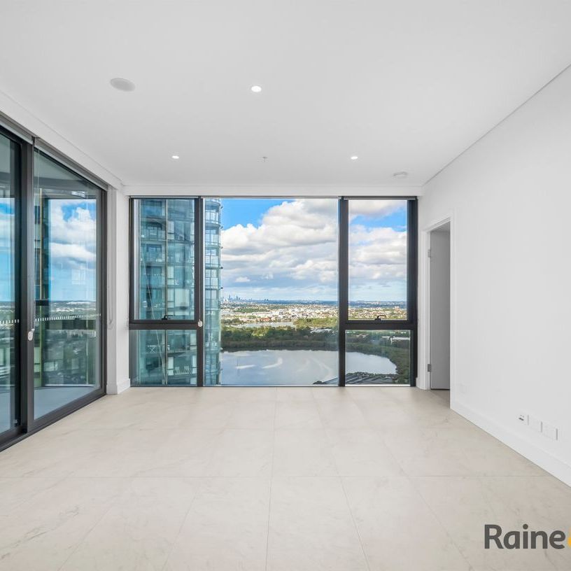 Near-New Luxury 2 Bedroom Apartment in the Heart of Rhodes Central - Photo 1