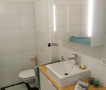 Architektonisch moderne Zweizimmerwohnung mit Caport und PKW-Stellp... - Foto 1