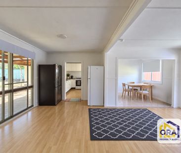 FRESHLY RENOVATED 4 BEDROOM HOME + BONUS STORAGE CONTAINER! - Photo 1