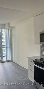 Yonge & Sheppard Bright +Spacious 1Bdrm +Den Open Concept Living Room - Photo 3