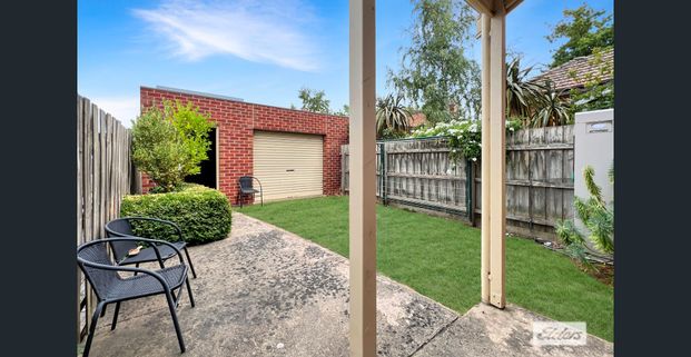 Centrally Located 3 Bedroom Townhouse - Photo 1