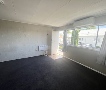 Step into comfort and convenience with this upstairs unit, freshly ... - Photo 1