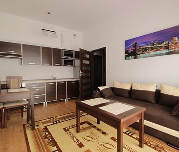 Kawalerka z ogródkiem na nowym osiedlu. - Фото 3