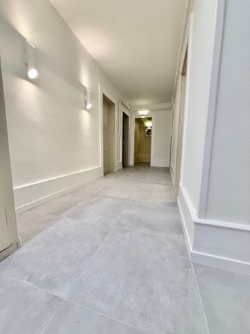 Joli appartement de 4 pièces au 1er étage avec balcon et jardin commun au centre du village de Travers - Photo 5