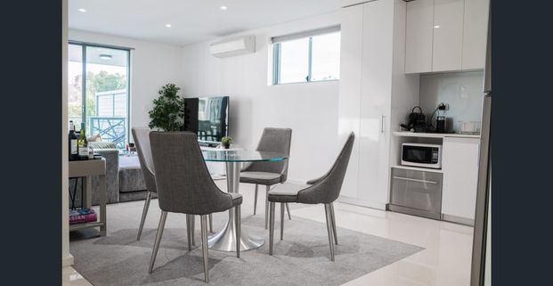 FURNISHED APARTMENT IN IDEAL LOCATION - Photo 1