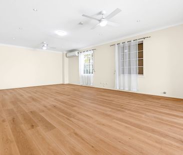 Spacious updated 4-Bedroom Family Home with Ample Parking - Photo 1