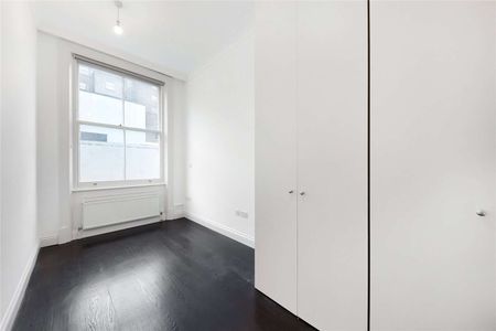 A ground floor apartment in a recently refurbished building benefitting from two bedroom and two bathrooms with an exceptional reception room and wooden flooring throughout. - Photo 5