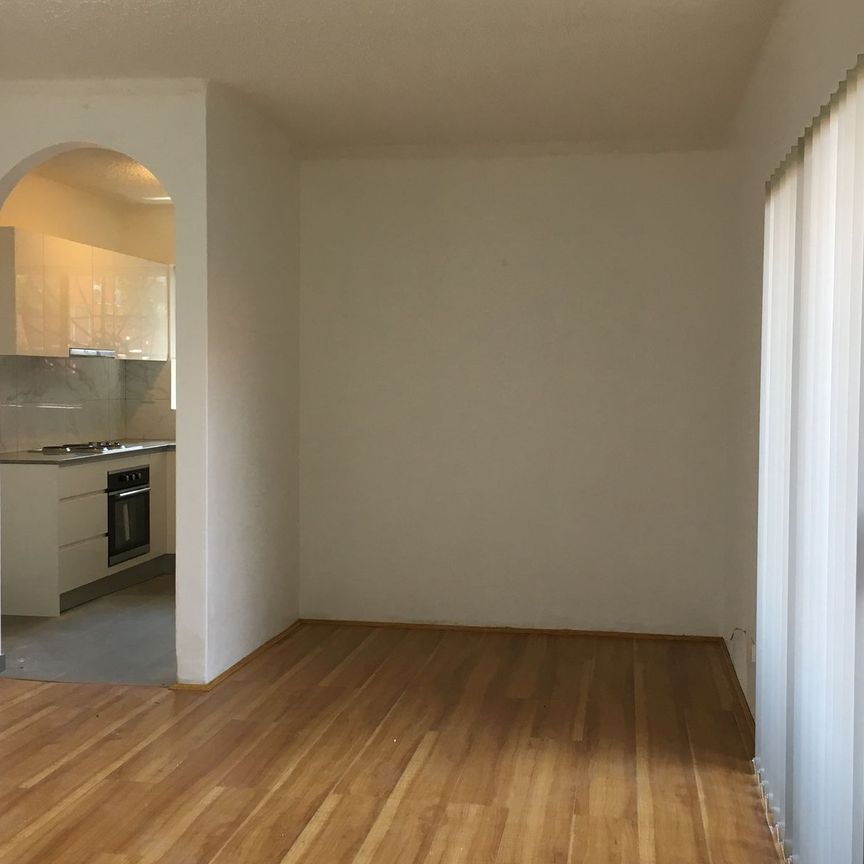 CONVENIENTLY LOCATED 2 BEDROOM UNIT - Photo 1