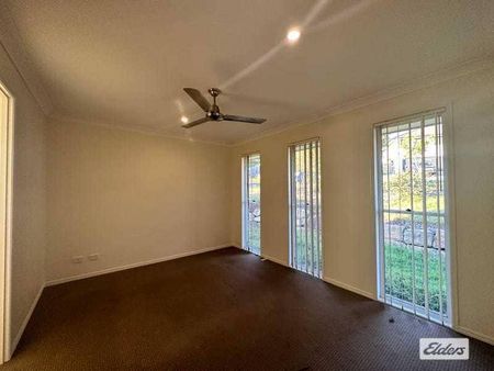 **For Rent: Spacious 4-Bedroom Brick Home with Outdoor Entertainment Area** - Photo 3