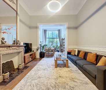 Gelijkvloerse verdieping met één slaapkamer in Saint-Gilles - Photo 5