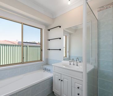 Charming 4 Bedroom Home Backing onto Bushland - Photo 6