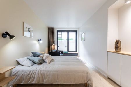 Luxueux rez-jardin avec 3 chambres / Quartier du Châtelain. - Foto 4