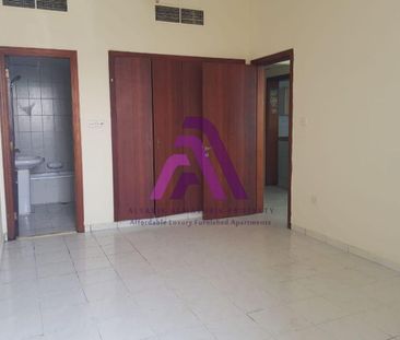 Spacious 1 BR Apartment in International City - Photo 1