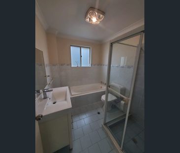 Penthouse Style unit | Great Location | Lock up garage - Photo 6