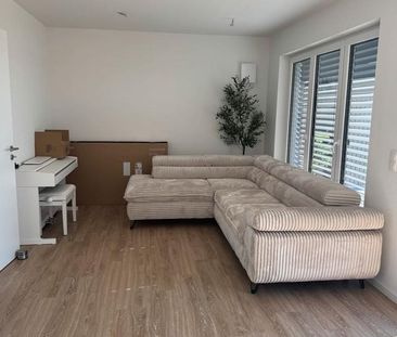 Neubau Wohnung Am See mit Garten & Terrasse zum 01.01. - Foto 1