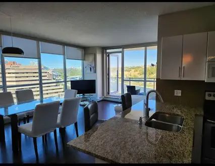 2 Bed + Den & 2 Bath Fully Furnished Waterfront Condo | 325 3 St SE, Calgary - Photo 1