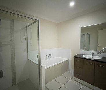 Modern 3-Bedroom Home with Fully Fenced Yard - Photo 6