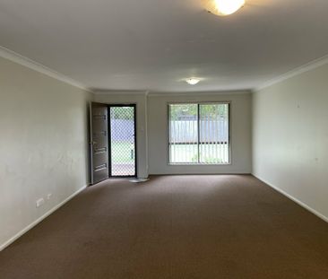 Lovely 2 bedroom brick unit - No Pets - Photo 1