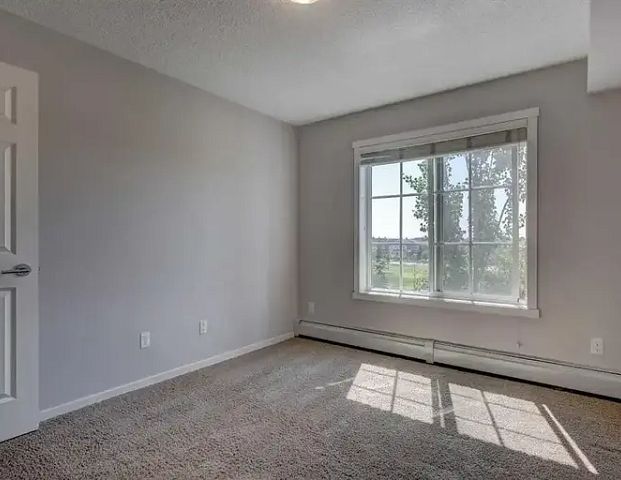 Stunning 2 bed 2 bath condo | 5311 - 755 Copperpond Blvd SE, Calgary - Photo 1